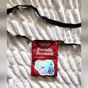 Handbook for the recently deceased crossbody purse..